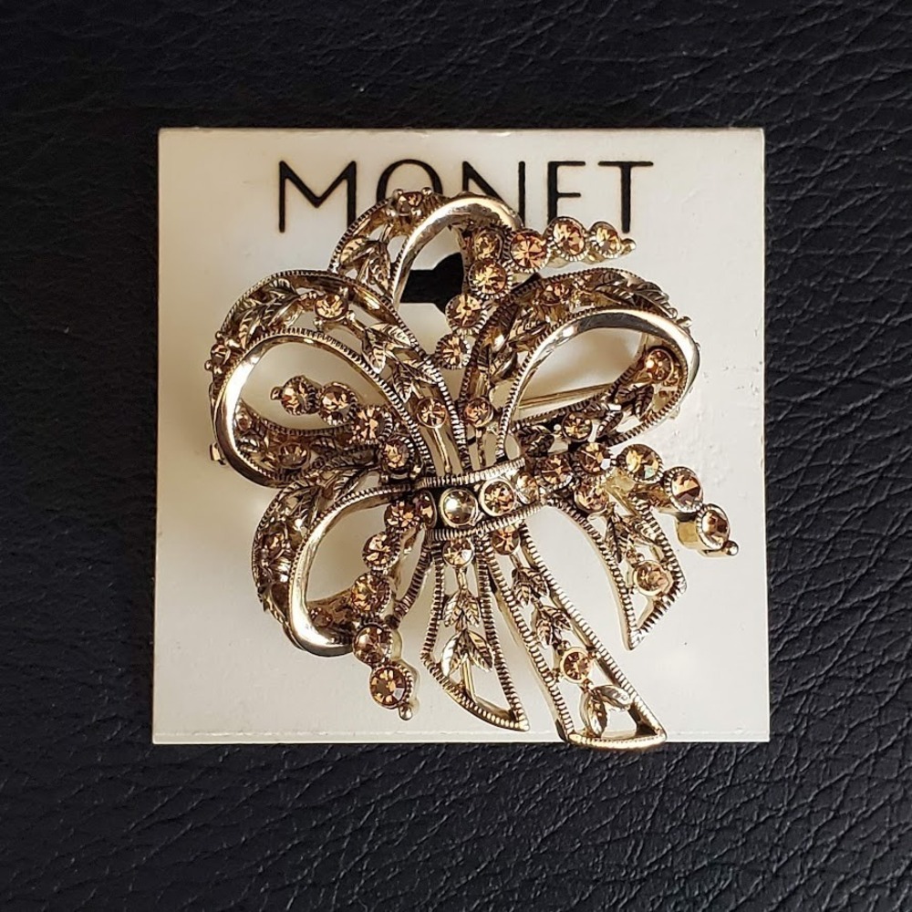 Monet Gold Tone Rhinestone Bow Brooch Pin Vintage Style Floral Ribbon Design
